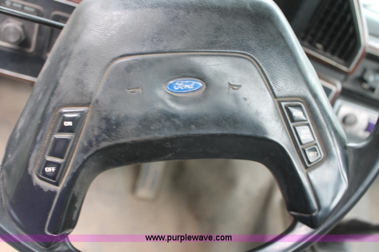 image for item C2525 1990 Ford F350 roll back truck