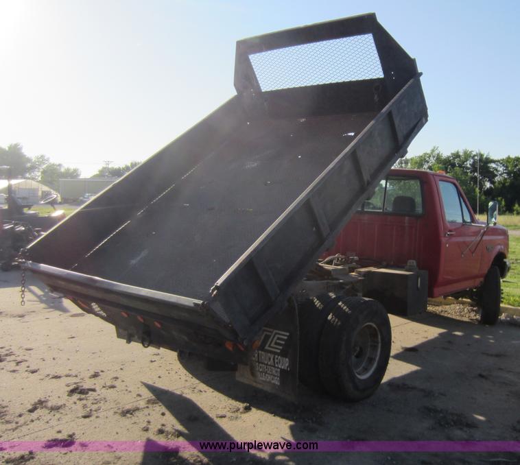 image for item V9102 1994 Ford F350 XL flatbed pickup truck