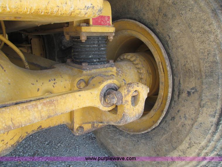 image for item A8313 2004 Caterpillar 740 articulated dump truck
