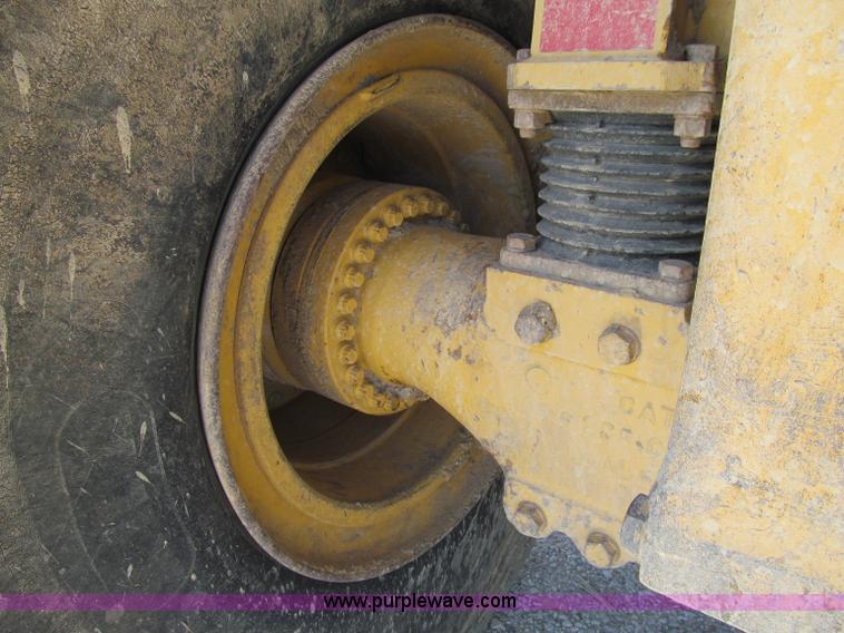 image for item A8313 2004 Caterpillar 740 articulated dump truck