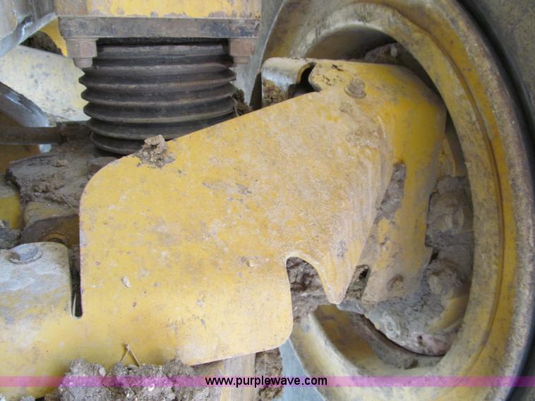 image for item A8313 2004 Caterpillar 740 articulated dump truck