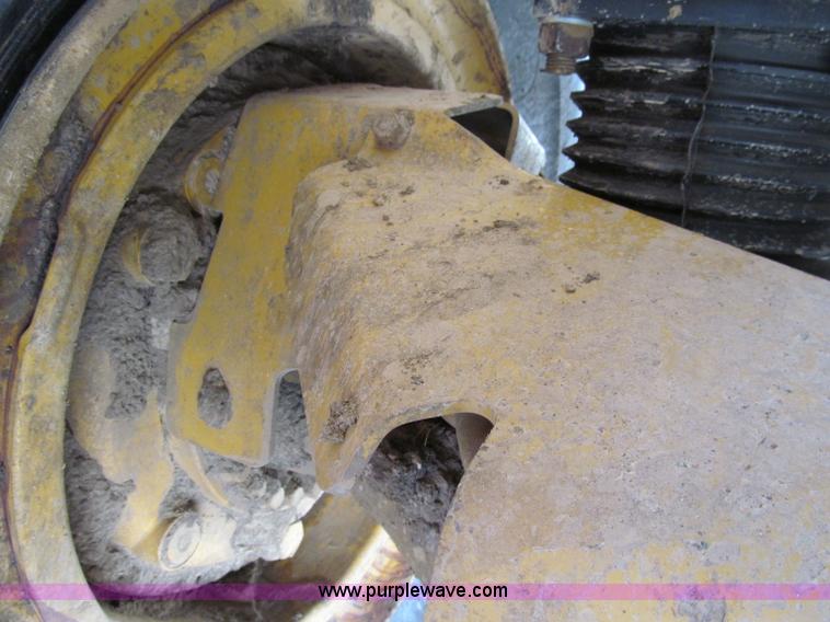 image for item A8313 2004 Caterpillar 740 articulated dump truck