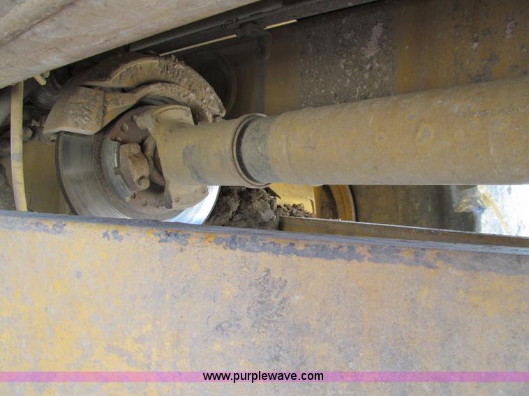 image for item A8313 2004 Caterpillar 740 articulated dump truck