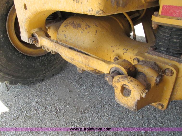 image for item A8313 2004 Caterpillar 740 articulated dump truck
