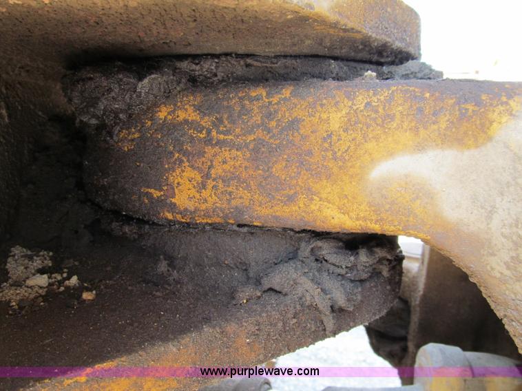 image for item A8313 2004 Caterpillar 740 articulated dump truck