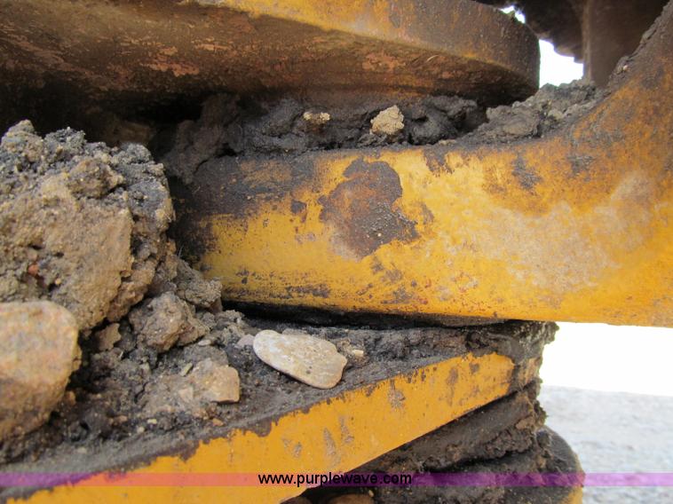 image for item A8313 2004 Caterpillar 740 articulated dump truck