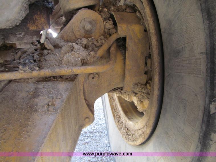 image for item A8313 2004 Caterpillar 740 articulated dump truck