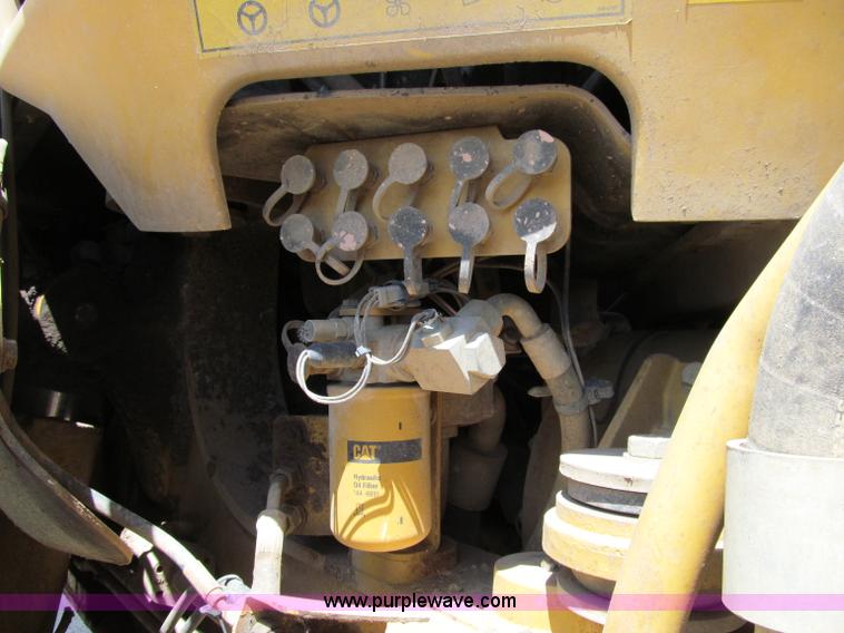 image for item A8313 2004 Caterpillar 740 articulated dump truck