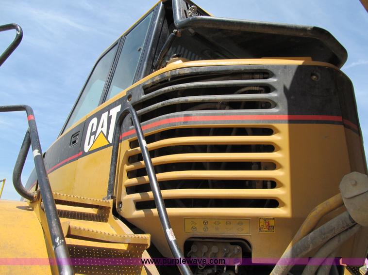 image for item A8313 2004 Caterpillar 740 articulated dump truck