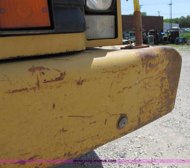 image for item A8313 2004 Caterpillar 740 articulated dump truck