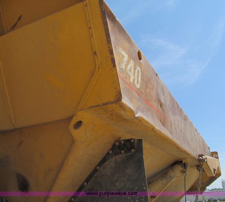 image for item A8313 2004 Caterpillar 740 articulated dump truck