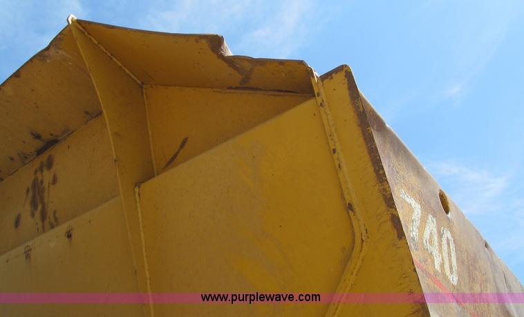 image for item A8313 2004 Caterpillar 740 articulated dump truck