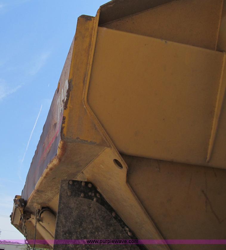 image for item A8313 2004 Caterpillar 740 articulated dump truck