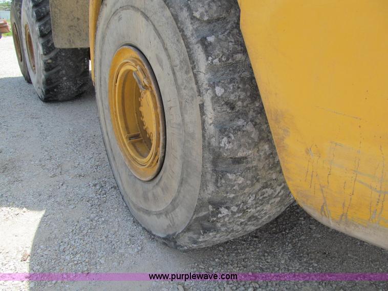 image for item A8313 2004 Caterpillar 740 articulated dump truck