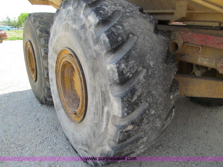 image for item A8313 2004 Caterpillar 740 articulated dump truck