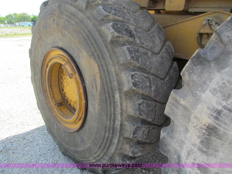 image for item A8313 2004 Caterpillar 740 articulated dump truck