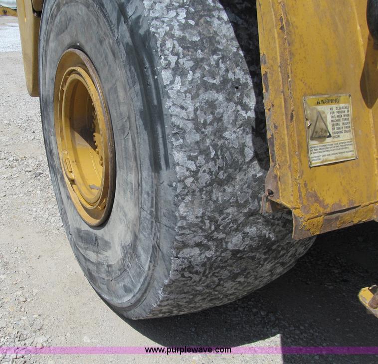 image for item A8313 2004 Caterpillar 740 articulated dump truck