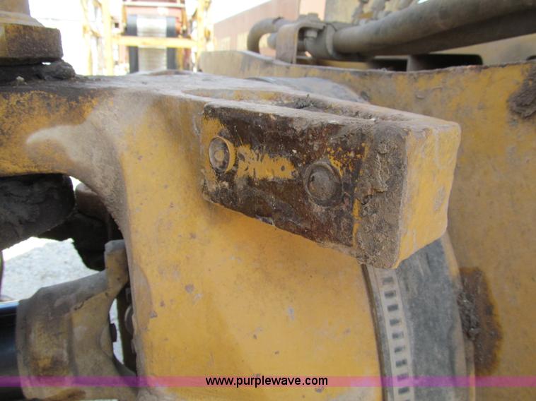 image for item A8313 2004 Caterpillar 740 articulated dump truck