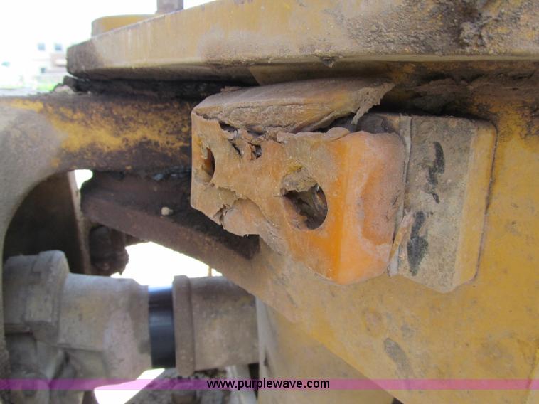 image for item A8313 2004 Caterpillar 740 articulated dump truck