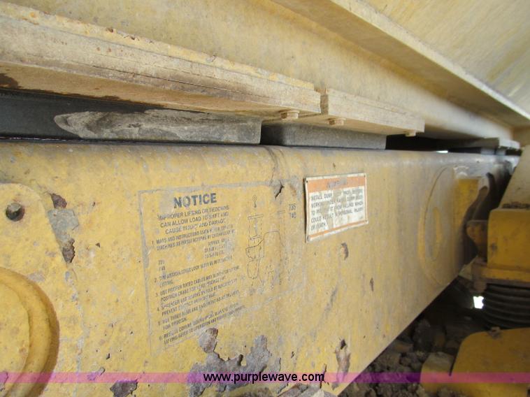 image for item A8313 2004 Caterpillar 740 articulated dump truck