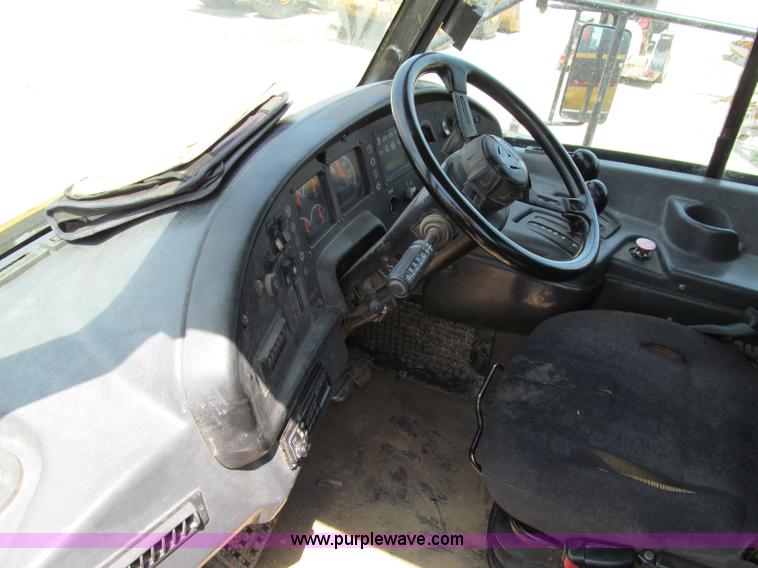 image for item A8313 2004 Caterpillar 740 articulated dump truck