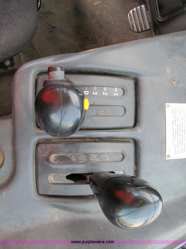 image for item A8313 2004 Caterpillar 740 articulated dump truck