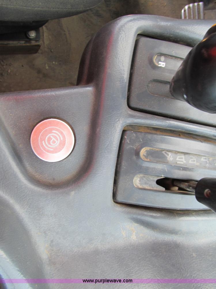 image for item A8313 2004 Caterpillar 740 articulated dump truck