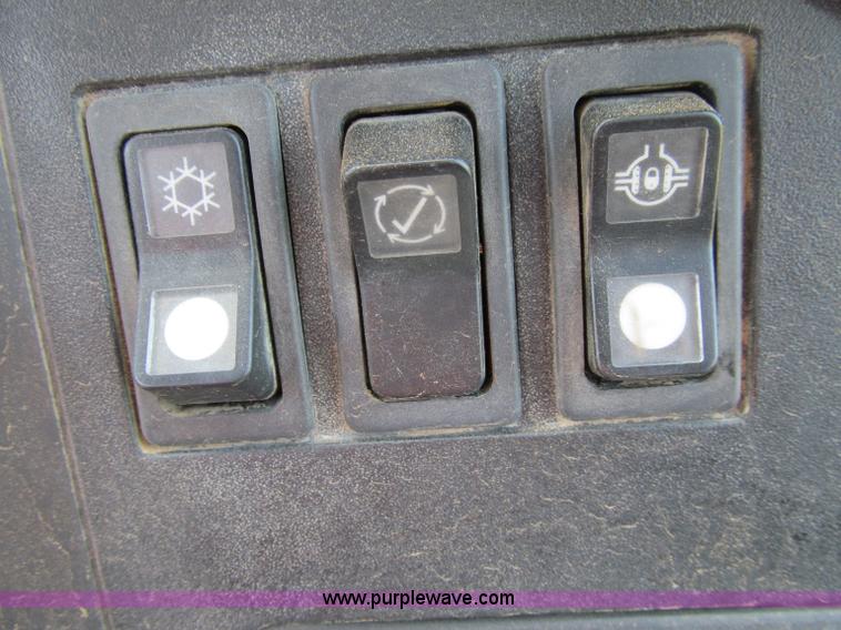 image for item A8313 2004 Caterpillar 740 articulated dump truck