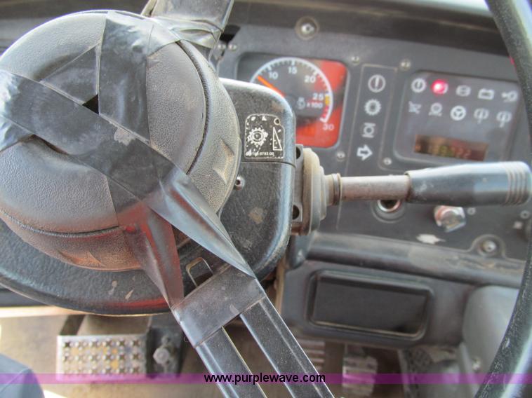 image for item A8313 2004 Caterpillar 740 articulated dump truck