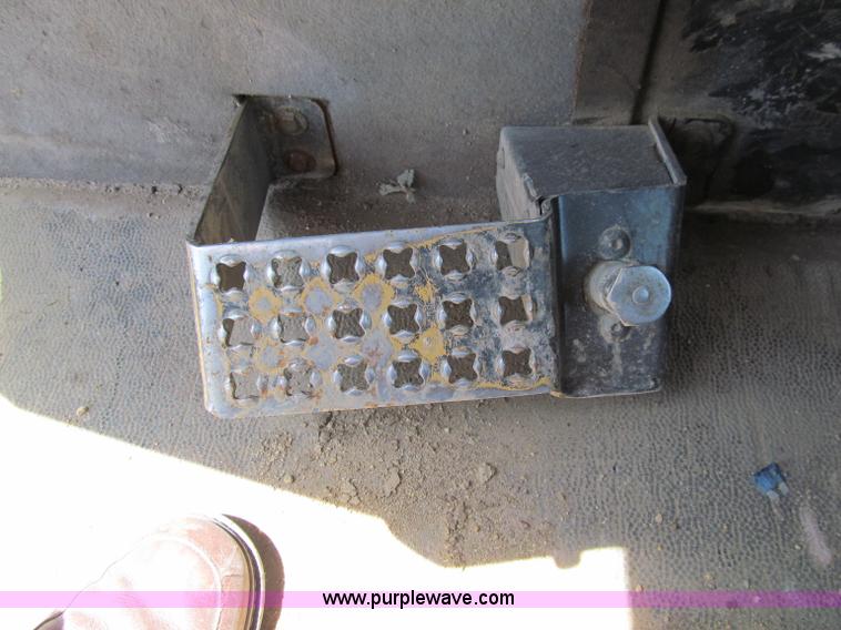 image for item A8313 2004 Caterpillar 740 articulated dump truck