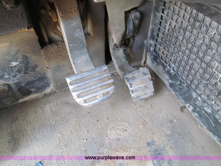 image for item A8313 2004 Caterpillar 740 articulated dump truck