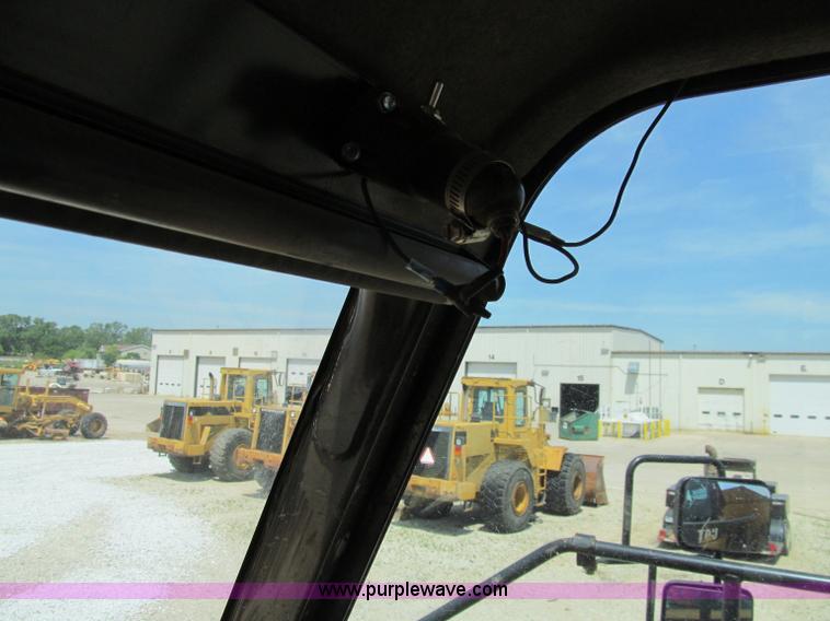 image for item A8313 2004 Caterpillar 740 articulated dump truck