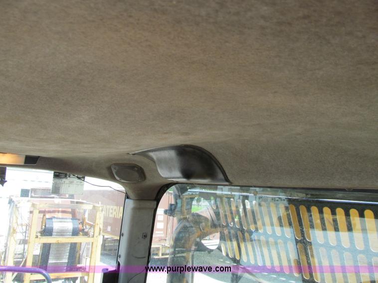 image for item A8313 2004 Caterpillar 740 articulated dump truck