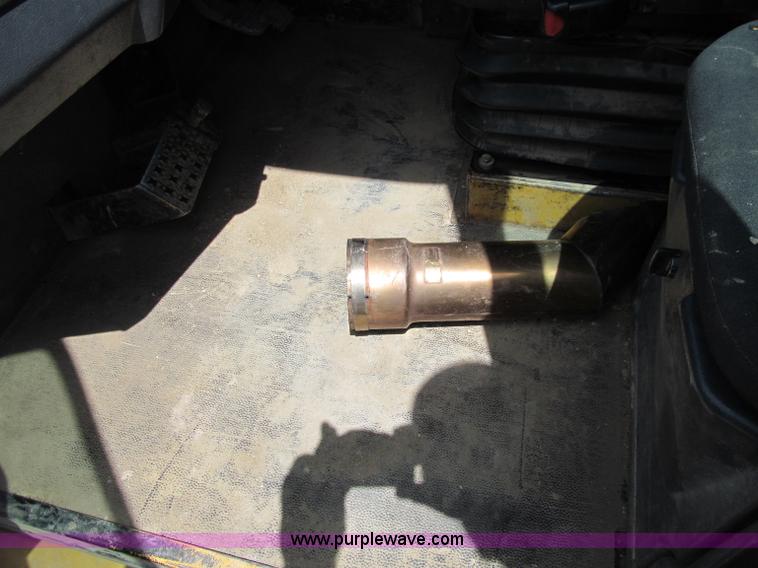 image for item A8313 2004 Caterpillar 740 articulated dump truck