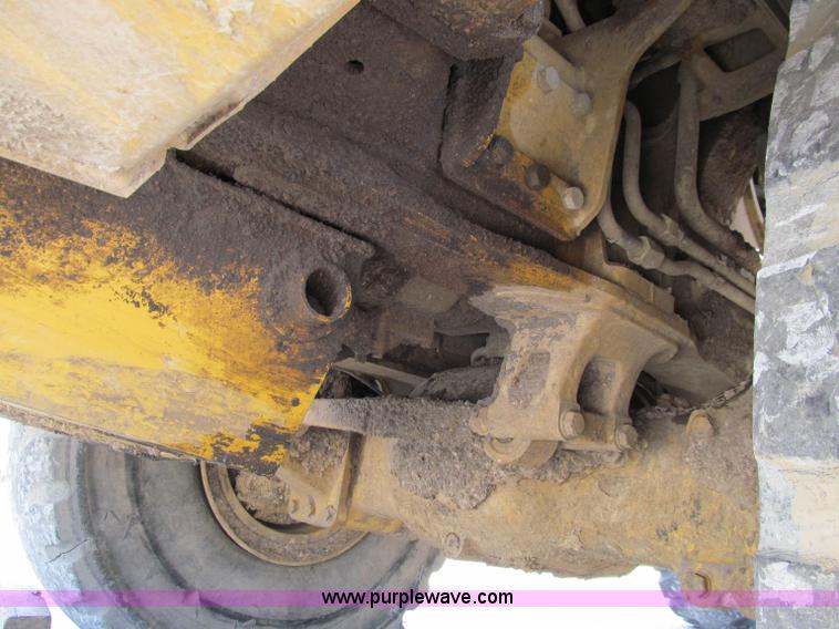 image for item A8313 2004 Caterpillar 740 articulated dump truck