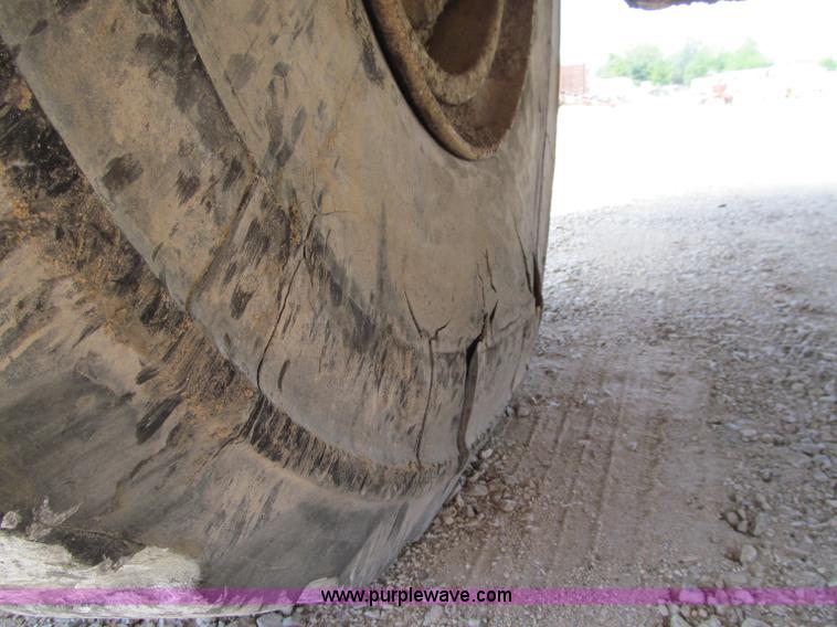 image for item A8313 2004 Caterpillar 740 articulated dump truck