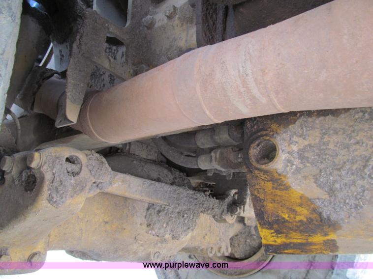 image for item A8313 2004 Caterpillar 740 articulated dump truck