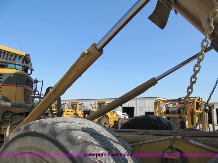 image for item A8313 2004 Caterpillar 740 articulated dump truck