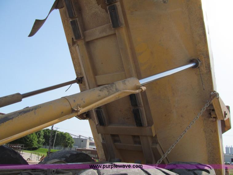 image for item A8313 2004 Caterpillar 740 articulated dump truck