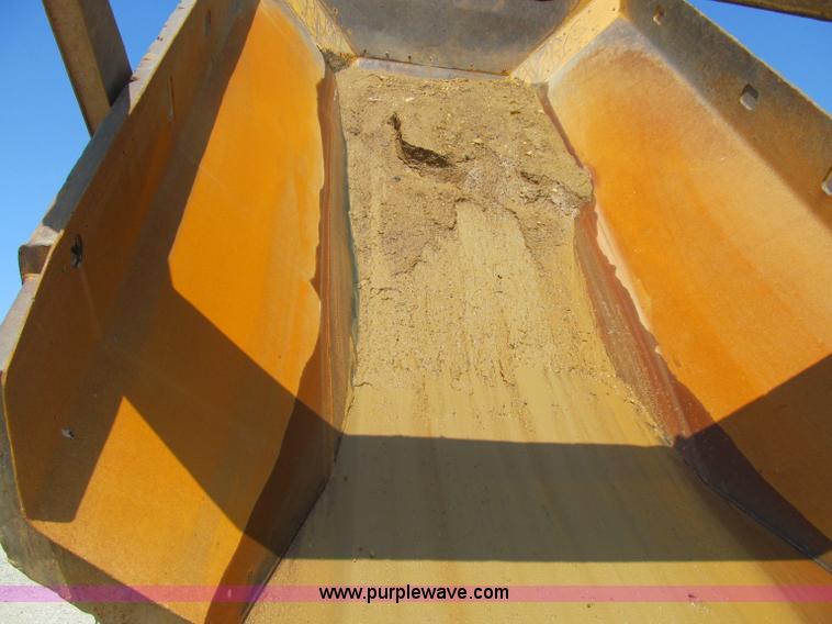 image for item A8313 2004 Caterpillar 740 articulated dump truck