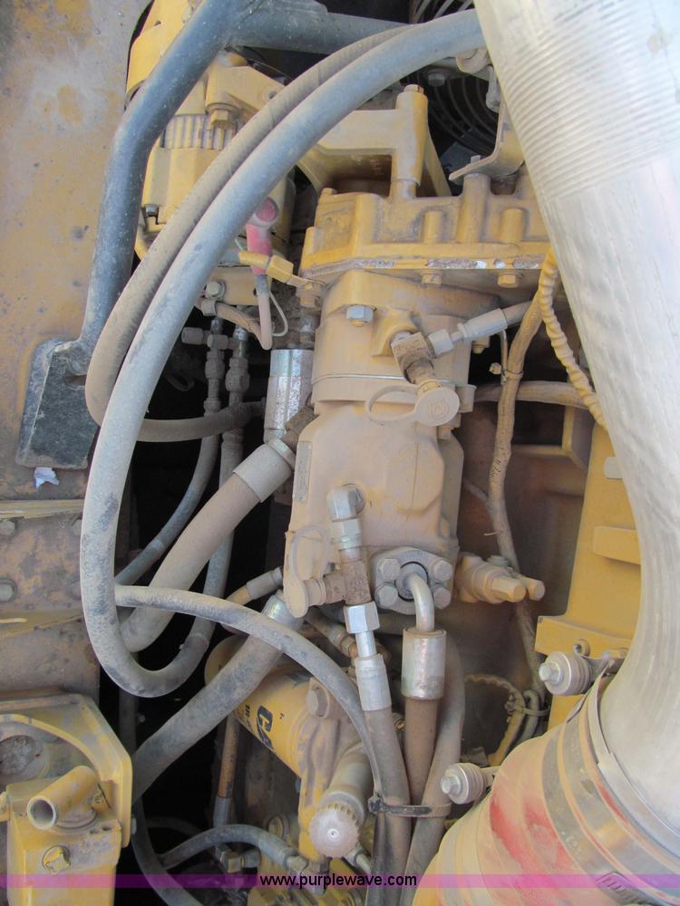 image for item A8313 2004 Caterpillar 740 articulated dump truck