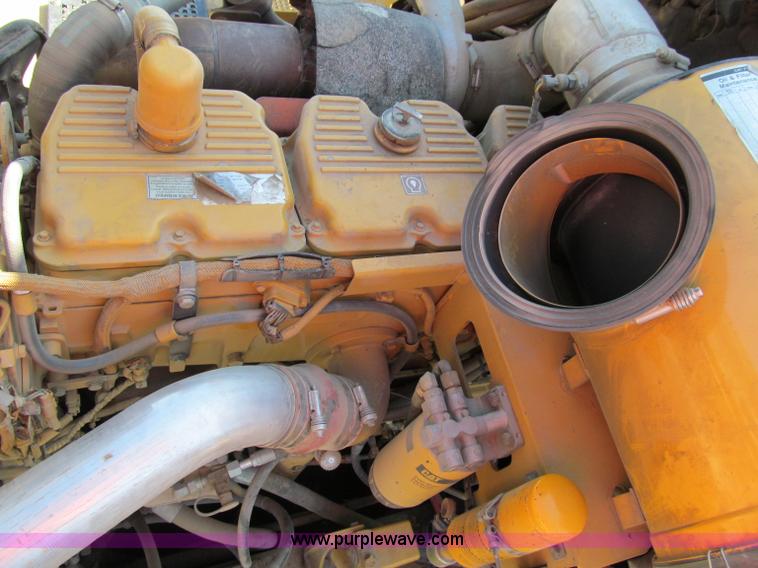 image for item A8313 2004 Caterpillar 740 articulated dump truck