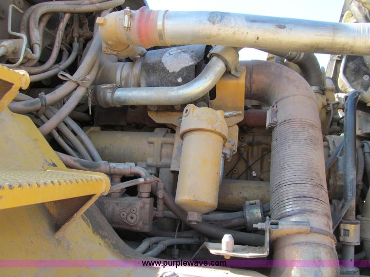 image for item A8313 2004 Caterpillar 740 articulated dump truck