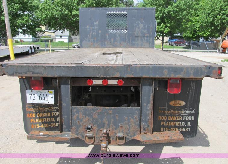 image for item B2709 2004 Ford F650 XL Super Duty flat bed truck