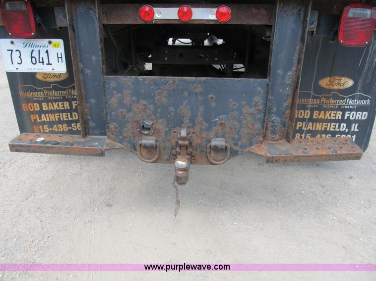 image for item B2709 2004 Ford F650 XL Super Duty flat bed truck