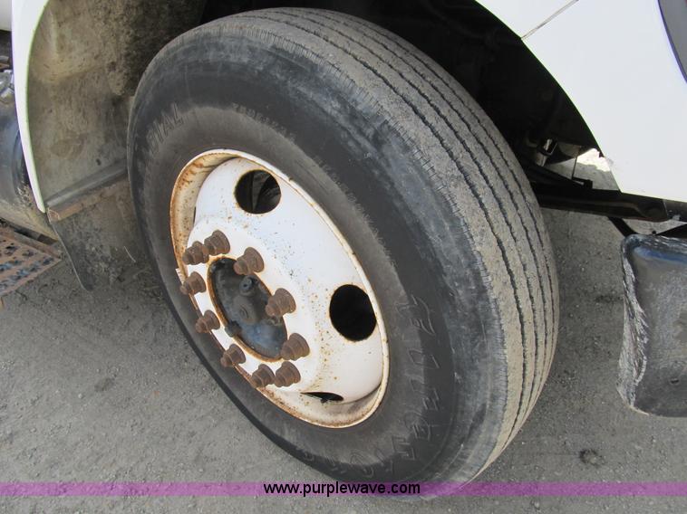 image for item B2709 2004 Ford F650 XL Super Duty flat bed truck