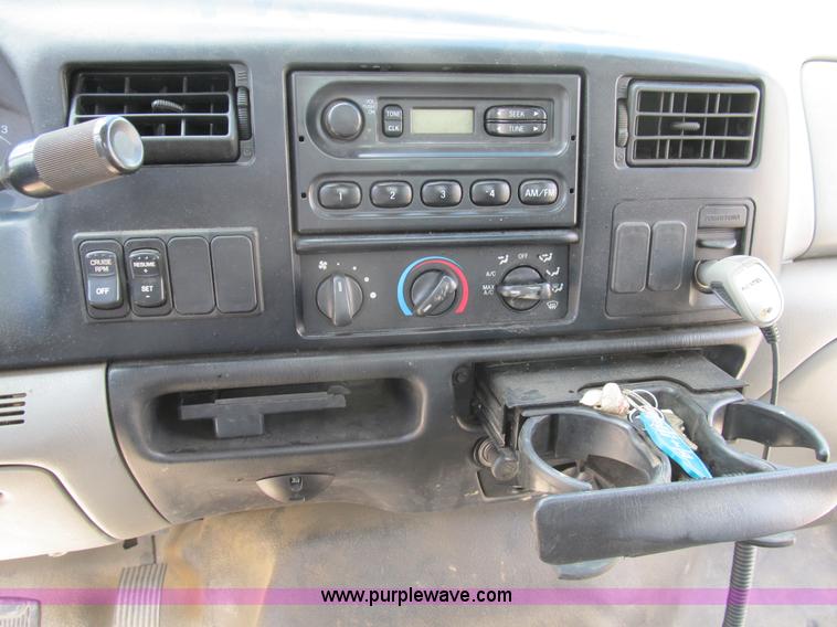 image for item B2709 2004 Ford F650 XL Super Duty flat bed truck