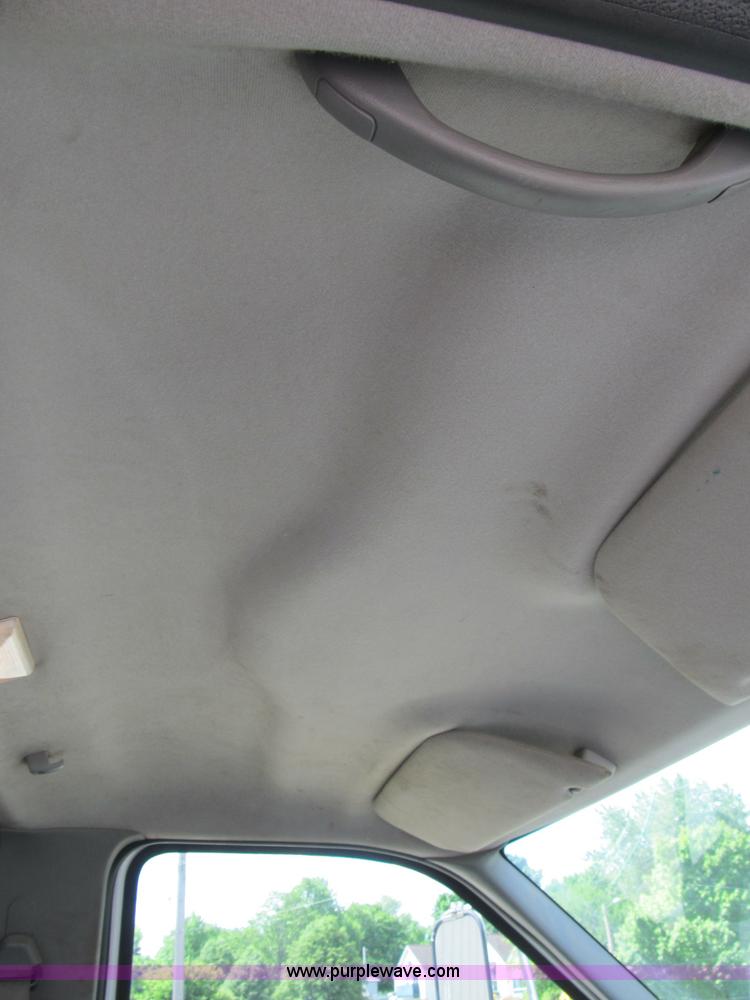 image for item B2709 2004 Ford F650 XL Super Duty flat bed truck