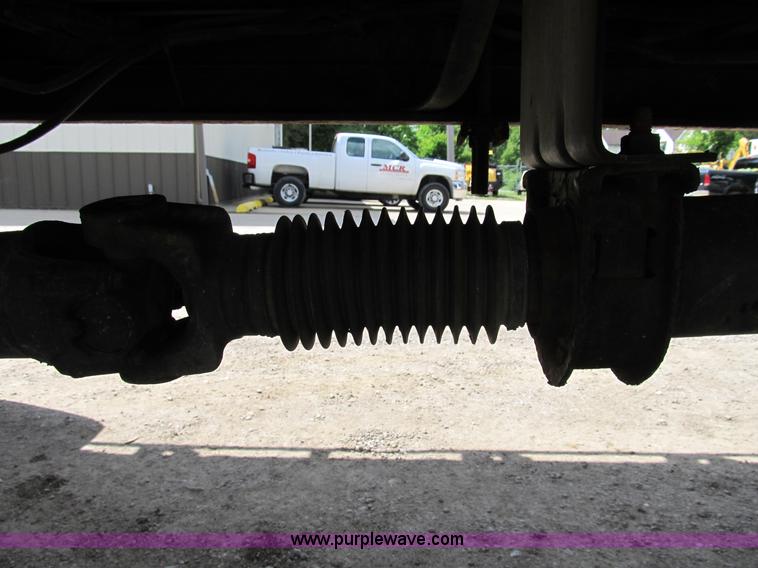 image for item B2709 2004 Ford F650 XL Super Duty flat bed truck