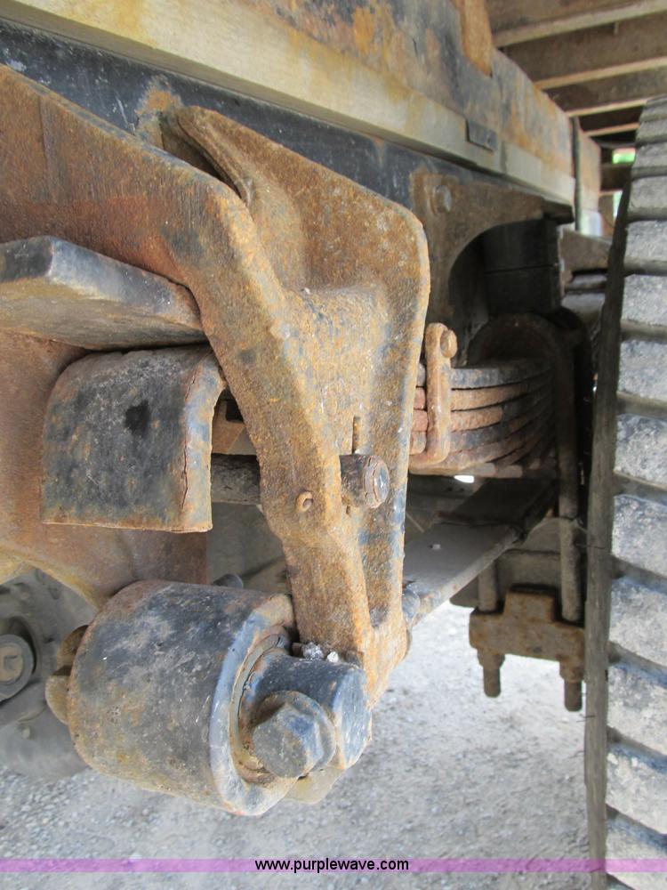 image for item B2709 2004 Ford F650 XL Super Duty flat bed truck